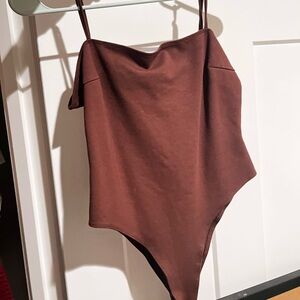 brown body suit